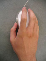 image of hand on computer mouse