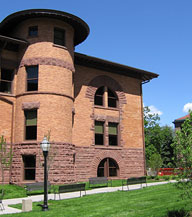 image description: photograph of the back of Nicholson Hall on a sunny day